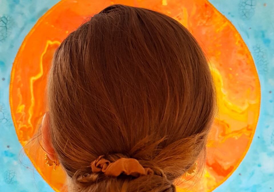 Eva in from of painting 'the woman clothet with the sun'